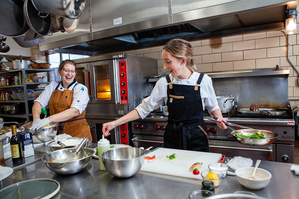 Restaurant Editorial Food Photographer Minnesota, two chefs working in industrial kitchen
